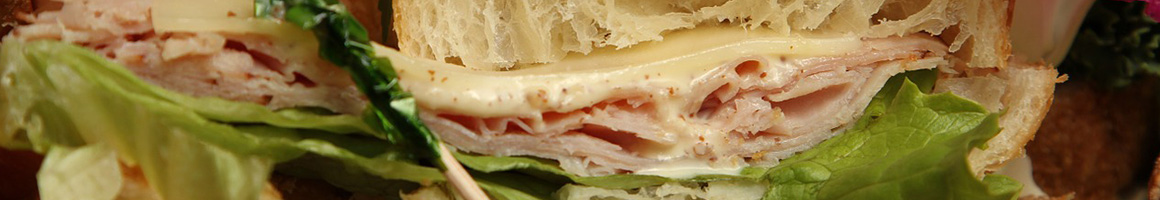 Eating Sandwich at Larry's Giant Subs restaurant in Orange Park, FL.